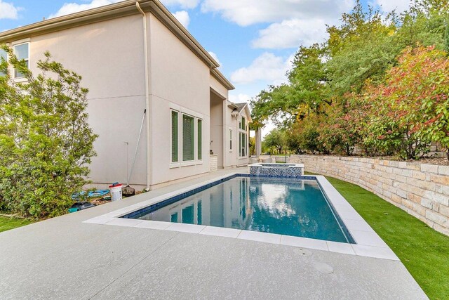 2601 Montebelluna Pl, Leander, TX 78641 - view of swimming pool featuring a patio and a pool with connected hot tub