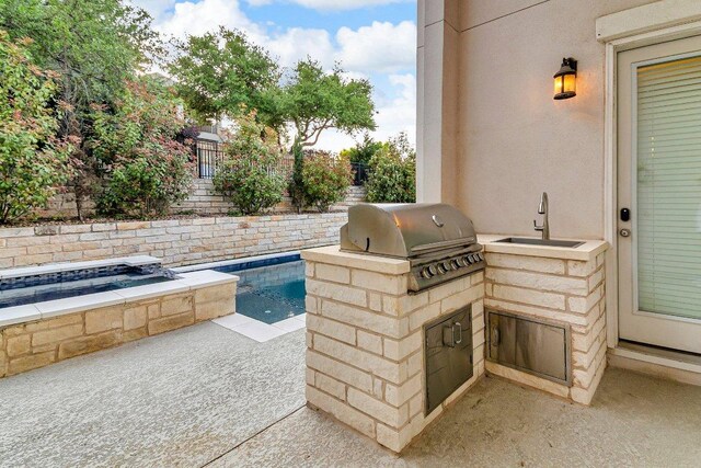2601 Montebelluna Pl, Leander, TX 78641 - view of patio featuring a sink and area for grilling