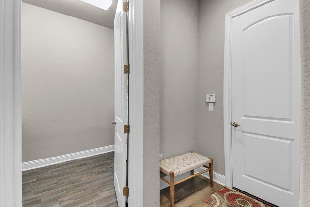 2601 Montebelluna Pl, Leander, TX 78641 - mudroom featuring baseboards and wood finished floors