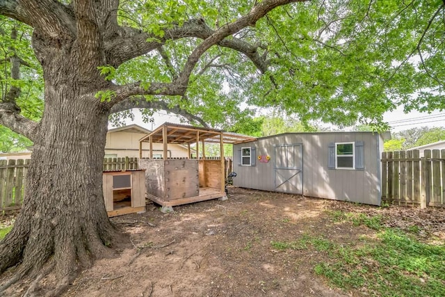 view of poultry coop with fence