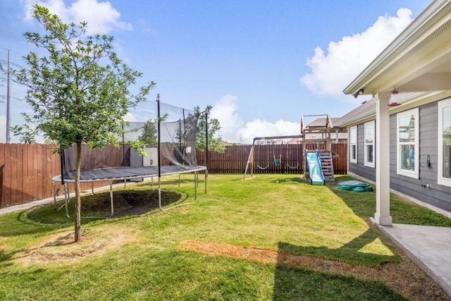 17109 Calipatria Ln, Pflugerville, TX 78660 - fenced backyard with a trampoline and a playground