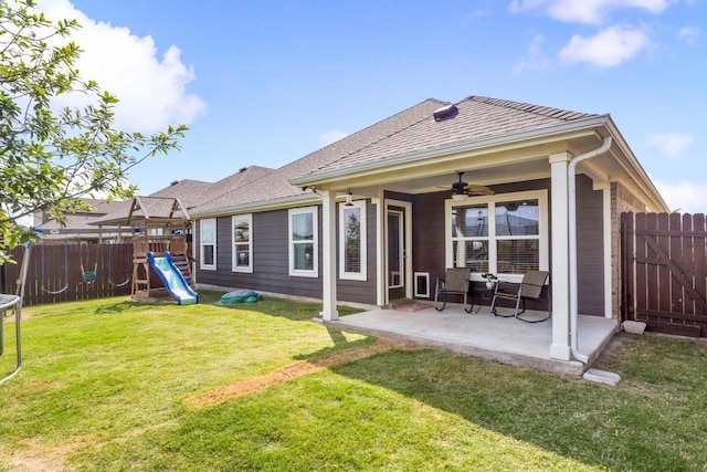 17109 Calipatria Ln, Pflugerville, TX 78660 - rear view of house with a playground, ceiling fan, a patio area, and a fenced backyard