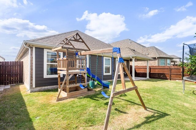 17109 Calipatria Ln, Pflugerville, TX 78660 - view of play area with a fenced backyard and a trampoline