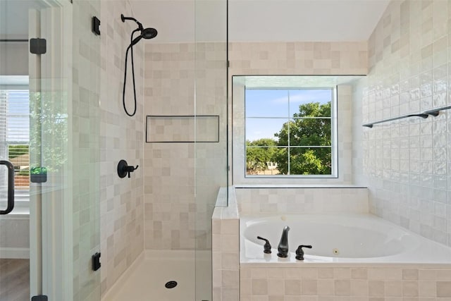 1006 Mesquite Hollow Pl, Round Rock, TX 78665 - bathroom with a stall shower and a whirlpool tub