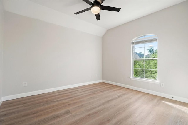 1006 Mesquite Hollow Pl, Round Rock, TX 78665 - empty room featuring ceiling fan, baseboards, wood finished floors, and lofted ceiling