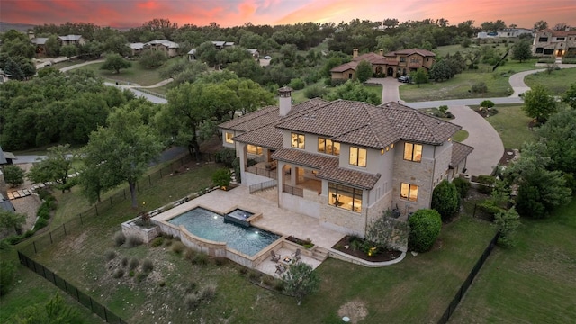 view of aerial view at dusk
