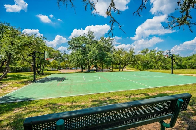view of sport court with a yard and community basketball court