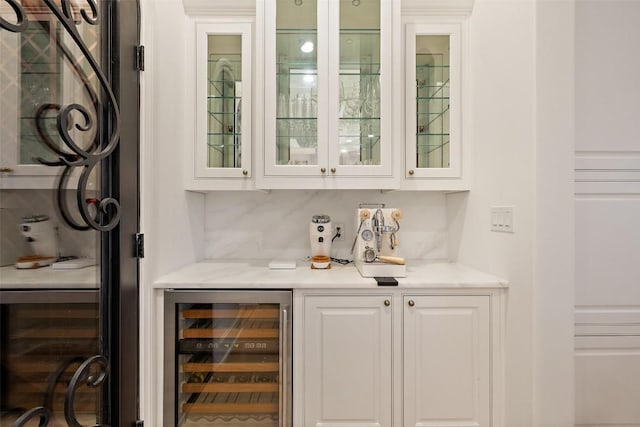bar featuring a dry bar and wine cooler
