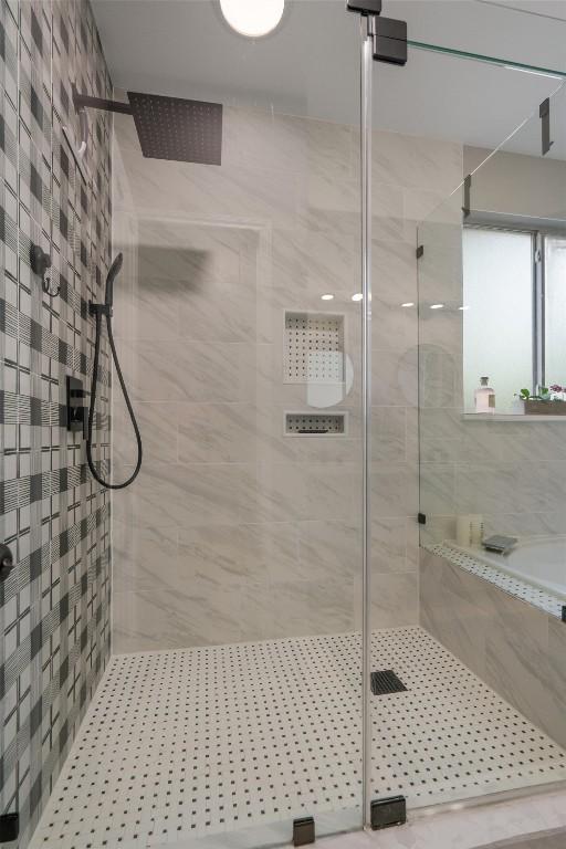 bathroom featuring a stall shower