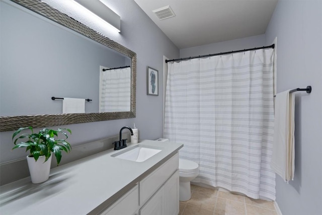 full bathroom featuring a shower with curtain, toilet, visible vents, tile patterned flooring, and vanity