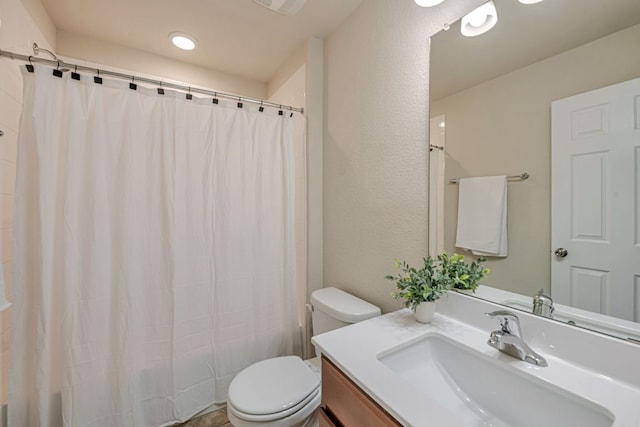 850 Hobby Rd, Copperas Cove, TX 76522 - full bath with toilet, vanity, shower / tub combo, and a textured wall