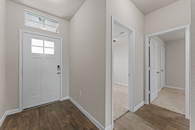 109 Rochester Ln, Hutto, TX 78634 - entrance foyer with dark wood-type flooring and baseboards