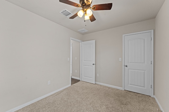 109 Rochester Ln, Hutto, TX 78634 - unfurnished bedroom featuring carpet floors, baseboards, and ceiling fan