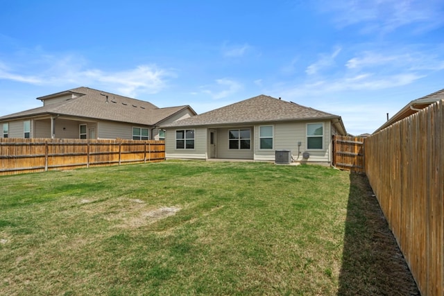 109 Rochester Ln, Hutto, TX 78634 - rear view of property featuring central air condition unit and a shingled roof