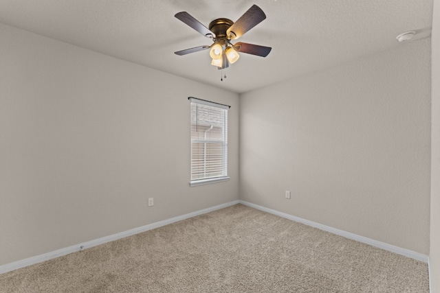 109 Rochester Ln, Hutto, TX 78634 - unfurnished room with carpet flooring, ceiling fan, baseboards, and a smoke detector