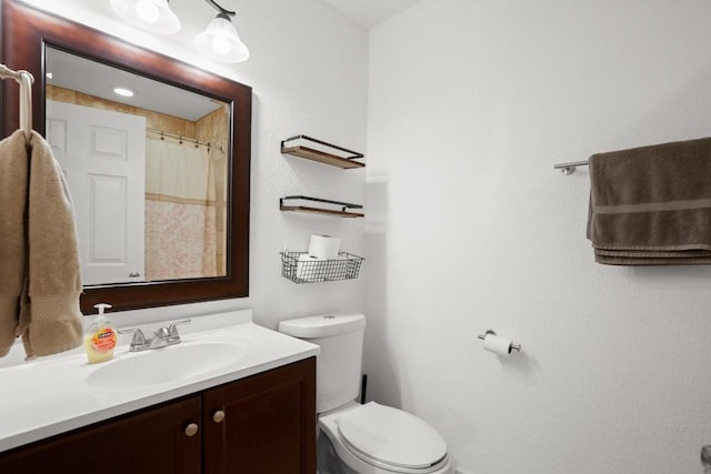 909 Reinli St Unit 104, Austin, TX 78751 - bathroom with vanity and toilet