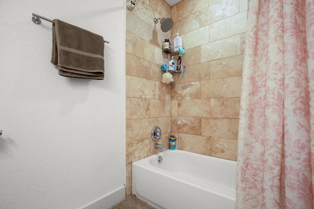 909 Reinli St Unit 104, Austin, TX 78751 - full bath with shower / bath combination with curtain and baseboards