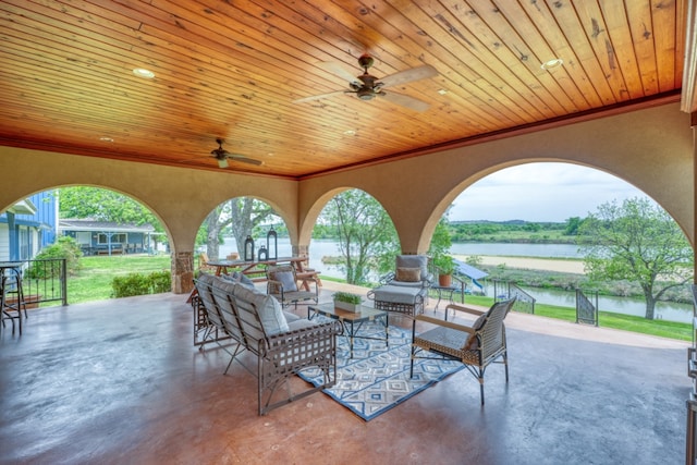 3320 River Oaks Dr, Kingsland, TX 78639 - view of patio featuring a water view, a ceiling fan, and an outdoor hangout area