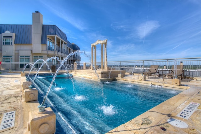 2918 N 620th Rd Unit O282, Austin, TX 78734 - community pool featuring a patio