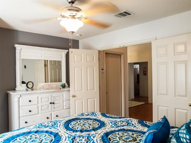 17300 Zola Ln, Round Rock, TX 78664 - bedroom with a ceiling fan and wood finished floors