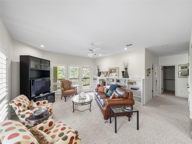7115 Las Ventanas Dr, Austin, TX 78731 - living room featuring light colored carpet, ceiling fan, and recessed lighting