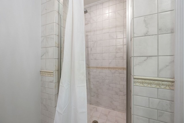 bathroom featuring a shower stall