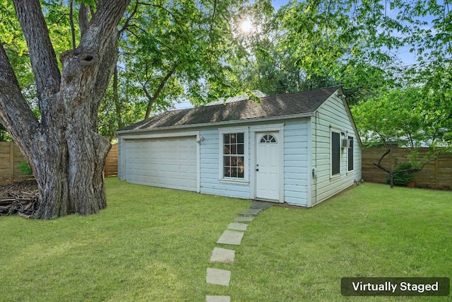 view of outbuilding featuring an outbuilding and a fenced backyard
