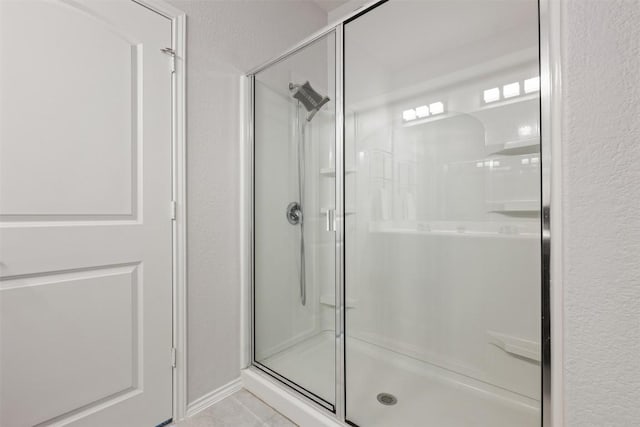 713 Hummingbird Ln, Leander, TX 78641 - full bathroom featuring a stall shower