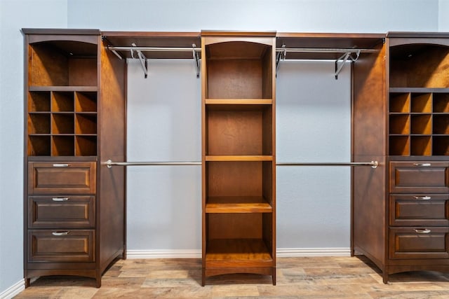713 Hummingbird Ln, Leander, TX 78641 - walk in closet with light wood-type flooring