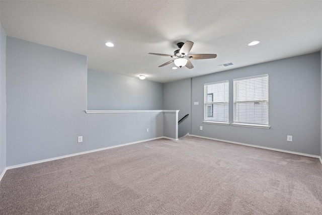 713 Hummingbird Ln, Leander, TX 78641 - carpeted spare room featuring ceiling fan and recessed lighting