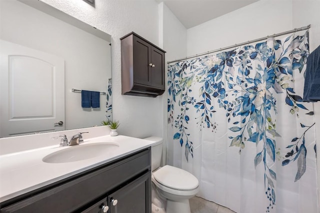 713 Hummingbird Ln, Leander, TX 78641 - bathroom featuring vanity, a shower with curtain, and tile patterned floors