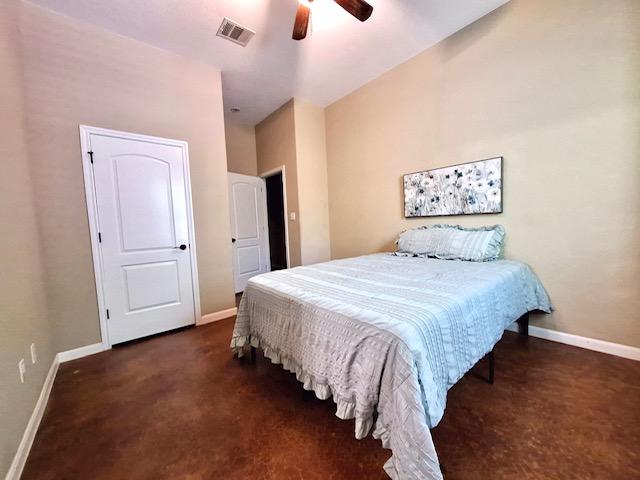 192 W Kaanapali Ln, Bastrop, TX 78602 - bedroom featuring baseboards and ceiling fan