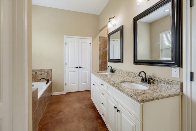 192 W Kaanapali Ln, Bastrop, TX 78602 - bathroom with double vanity and a garden tub