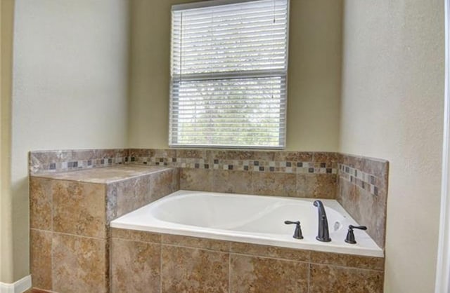 bathroom with a bath
