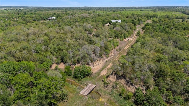 550 League Line Rd, Smithville, TX 78957 - aerial view of property's location with a heavily wooded area