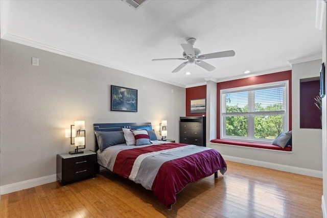 550 League Line Rd, Smithville, TX 78957 - bedroom with baseboards, crown molding, light wood finished floors, recessed lighting, and ceiling fan