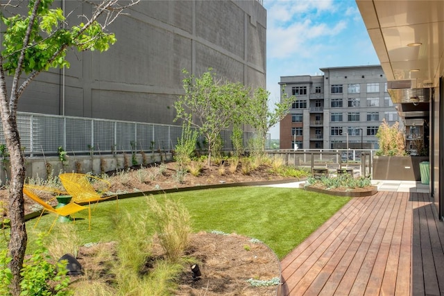 view of home's community featuring a yard