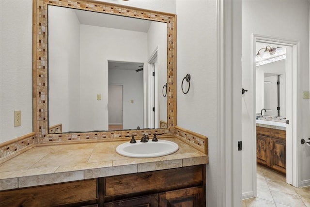 13606 Montview Dr, Austin, TX 78732 - bathroom with vanity and tile patterned floors