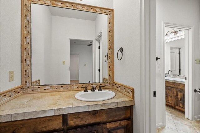 13606 Montview Dr, Austin, TX 78732 - bathroom with vanity and tile patterned floors