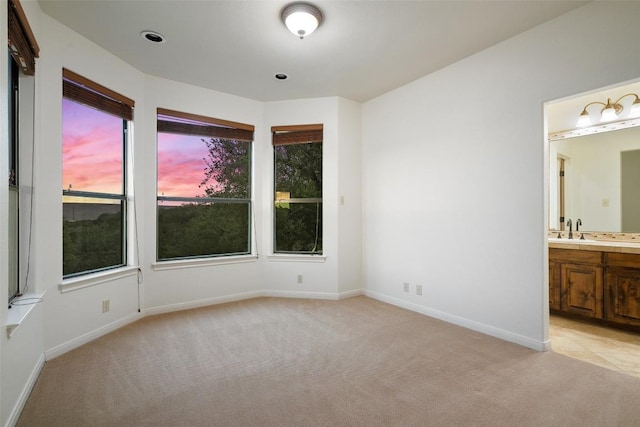 13606 Montview Dr, Austin, TX 78732 - empty room featuring light carpet and baseboards