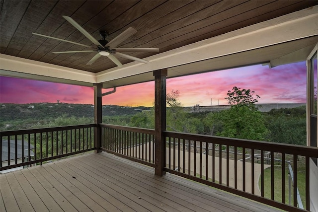 13606 Montview Dr, Austin, TX 78732 - deck at dusk with a ceiling fan