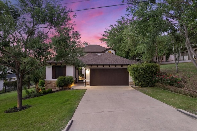 13606 Montview Dr, Austin, TX 78732 - view of front of property with an attached garage, driveway, a lawn, stucco siding, and a shingled roof