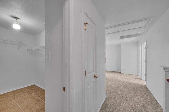 hallway with visible vents