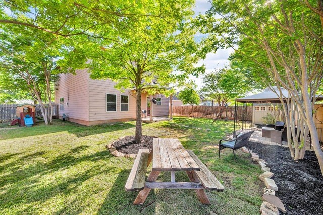 1013 Hondo Ln, Hutto, TX 78634 - view of yard with a fenced backyard