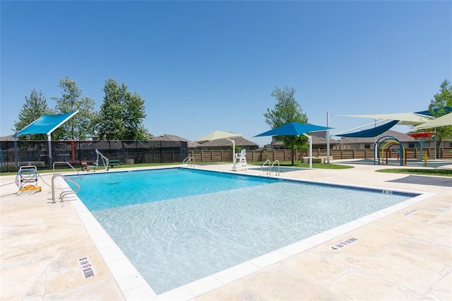 157 Brickyard Ln, Jarrell, TX 76537 - community pool with a patio area