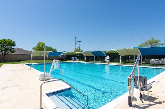 157 Brickyard Ln, Jarrell, TX 76537 - community pool featuring a patio