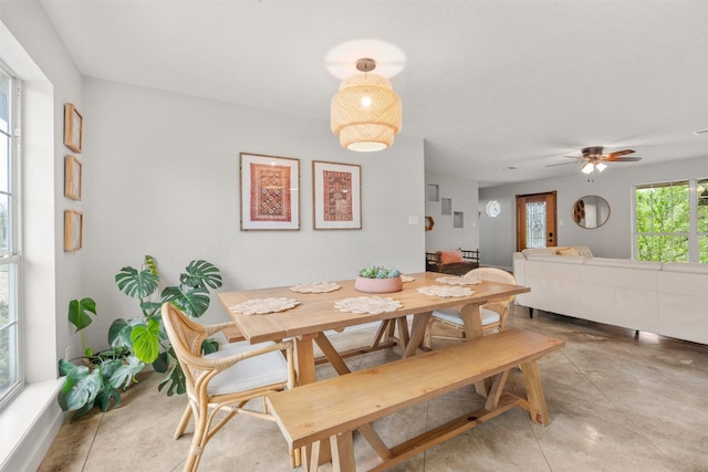 12099 Bonham Ranch Rd, Dripping Springs, TX 78620 - dining area with a ceiling fan and concrete floors