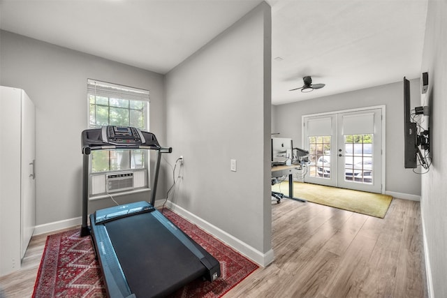 12099 Bonham Ranch Rd, Dripping Springs, TX 78620 - exercise area featuring french doors, baseboards, and wood finished floors