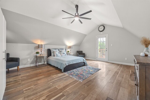 12099 Bonham Ranch Rd, Dripping Springs, TX 78620 - bedroom featuring access to outside, wood-type flooring, baseboards, lofted ceiling, and ceiling fan