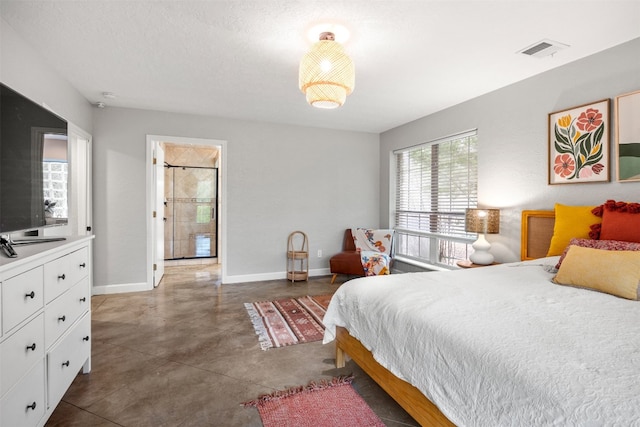 12099 Bonham Ranch Rd, Dripping Springs, TX 78620 - bedroom featuring baseboards and concrete flooring
